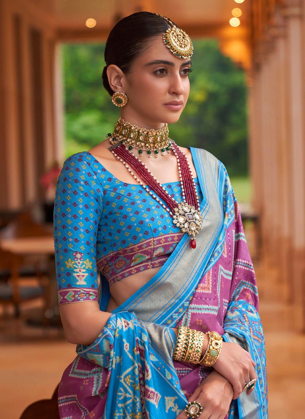 Contemporary Patola Silk Aqua Blue Purple Patch Border Saree