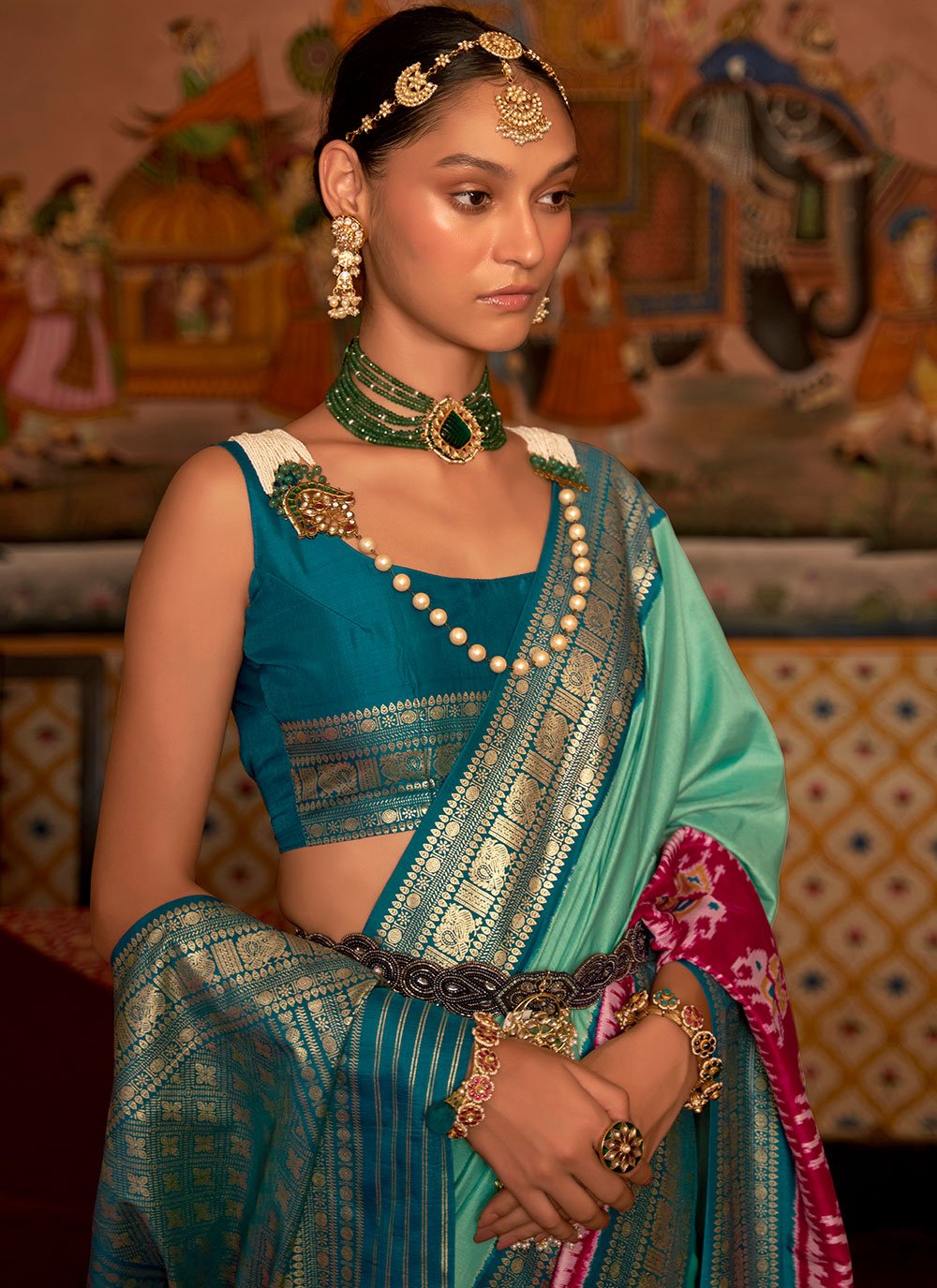 Classic Patola Silk Turquoise Patch Border Saree