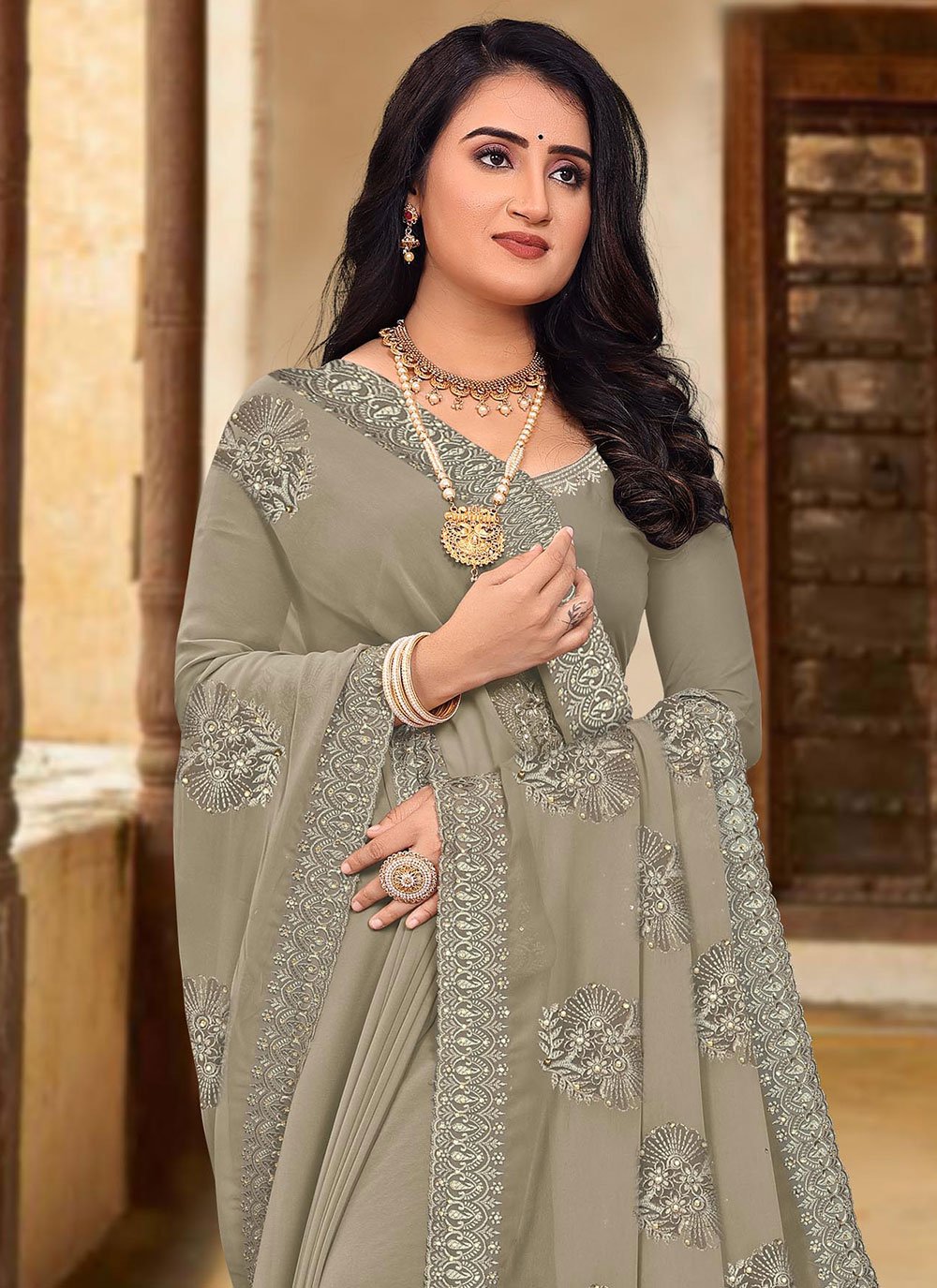 Contemporary Georgette Brown Embroidered Saree