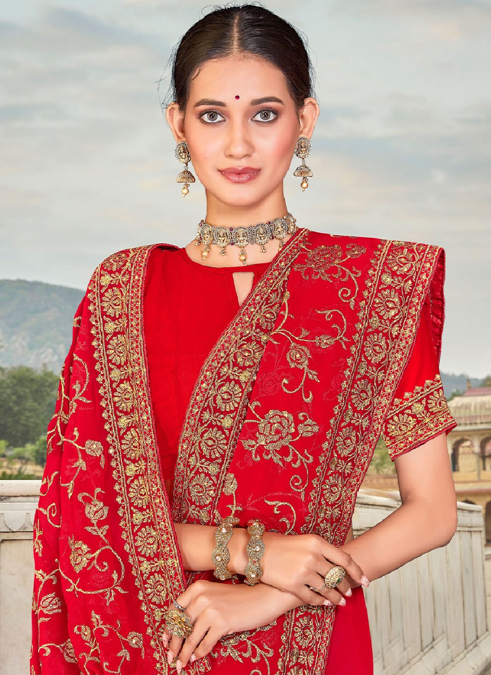 Classic Georgette Red Embroidered Saree