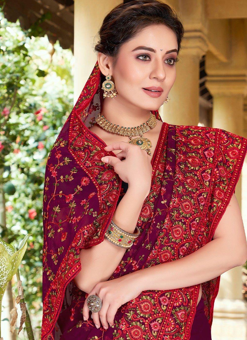 Classic Georgette Purple Embroidered Saree