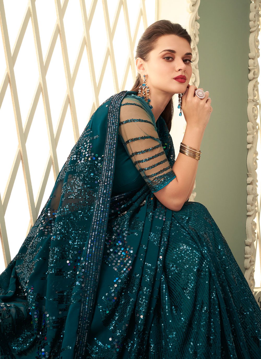 Contemporary Georgette Teal Embroidered Saree