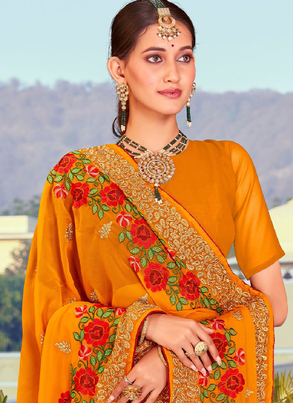 Classic Georgette Orange Embroidered Saree