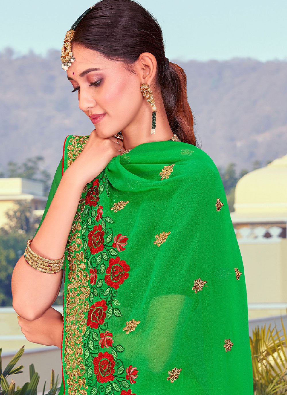 Classic Georgette Green Embroidered Saree
