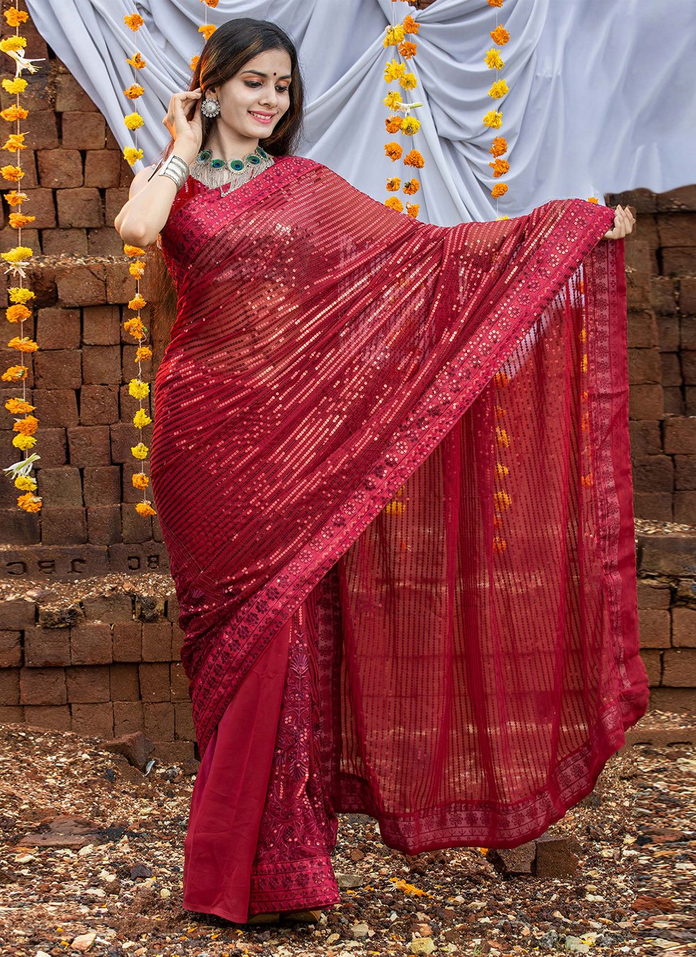 Classic Georgette Maroon Embroidered Saree