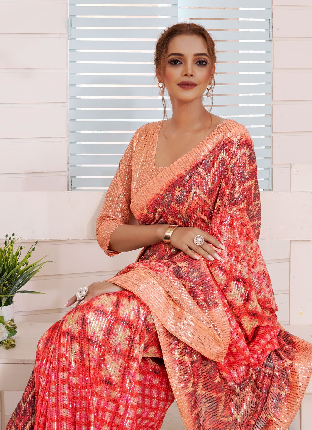 Contemporary Imported Orange Sequins Saree