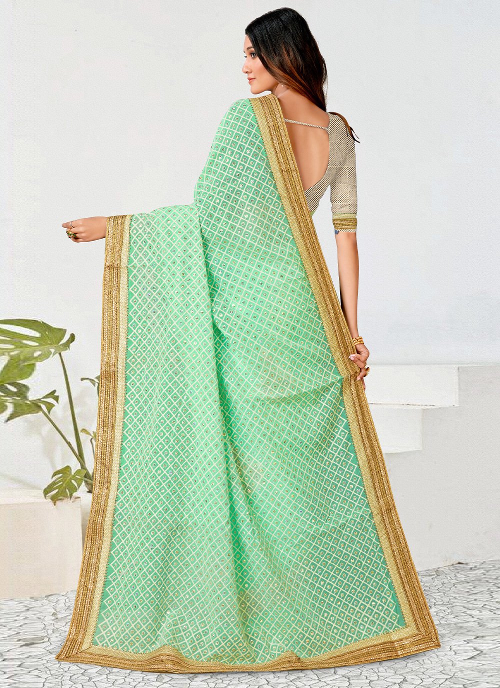 Contemporary Georgette Net Sea Green Patch Border Saree