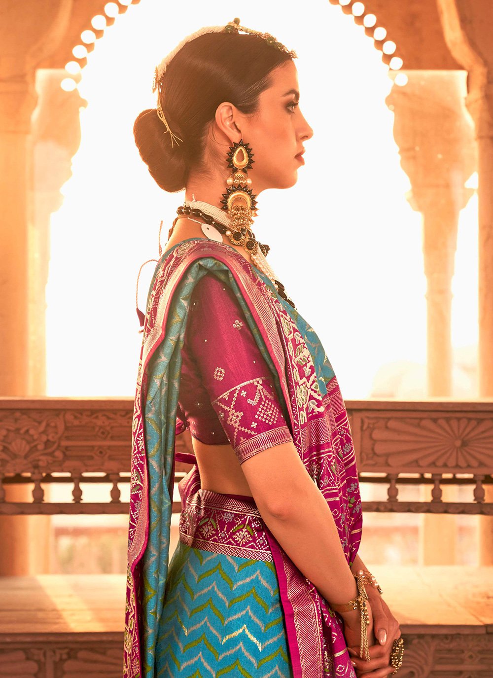 Contemporary Silk Turquoise Patola Print Saree