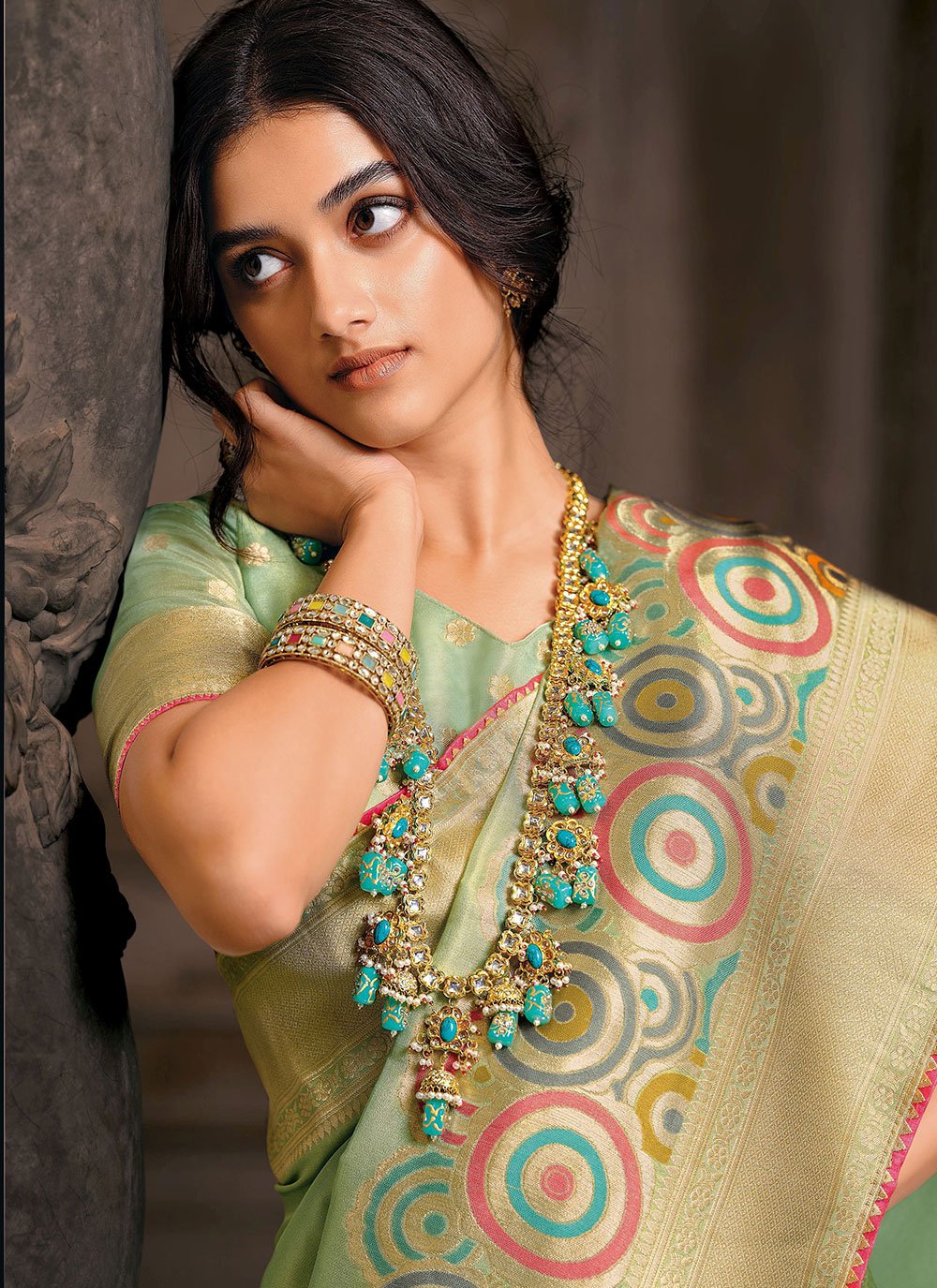 Contemporary Silk Tissue Green Meenakari Saree