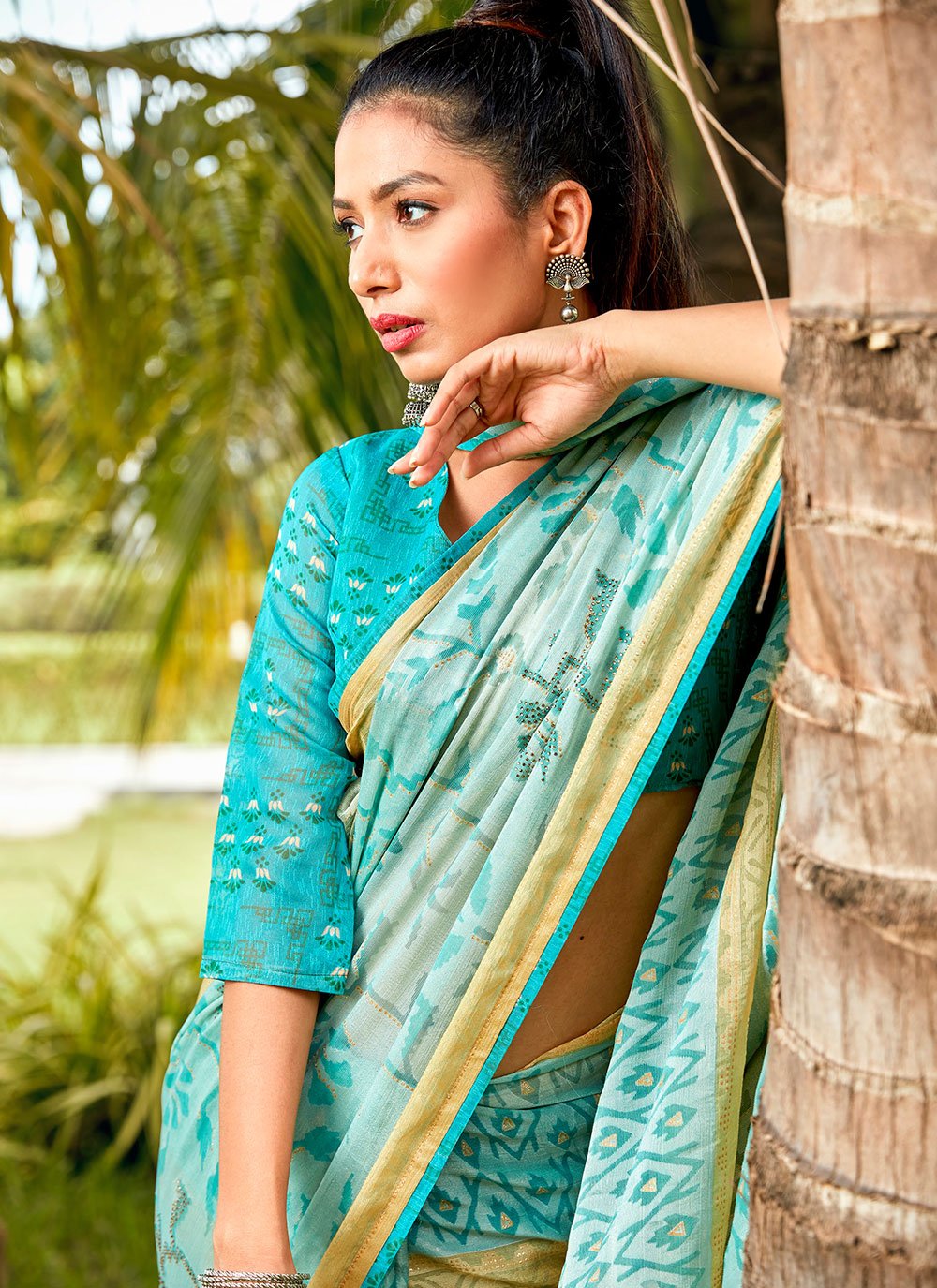 Classic Brasso Aqua Blue Fancy Work Saree