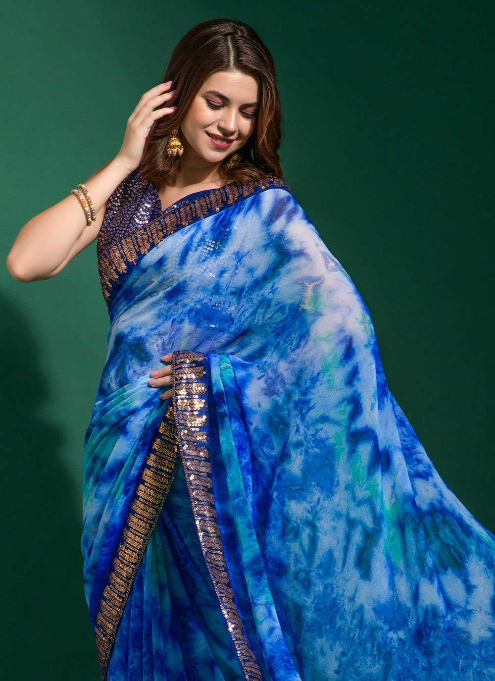 Contemporary Chiffon Aqua Blue Patch Border Saree