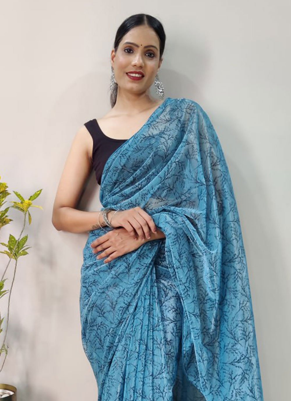 Contemporary Net Aqua Blue Print Saree