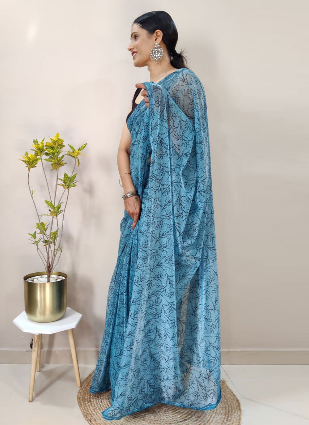 Contemporary Net Aqua Blue Print Saree