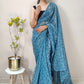Contemporary Net Aqua Blue Print Saree