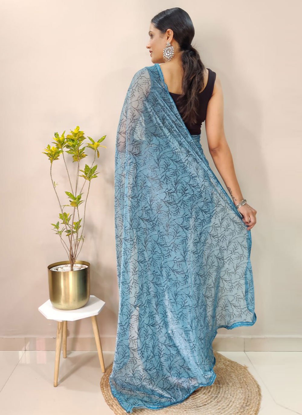 Contemporary Net Aqua Blue Print Saree