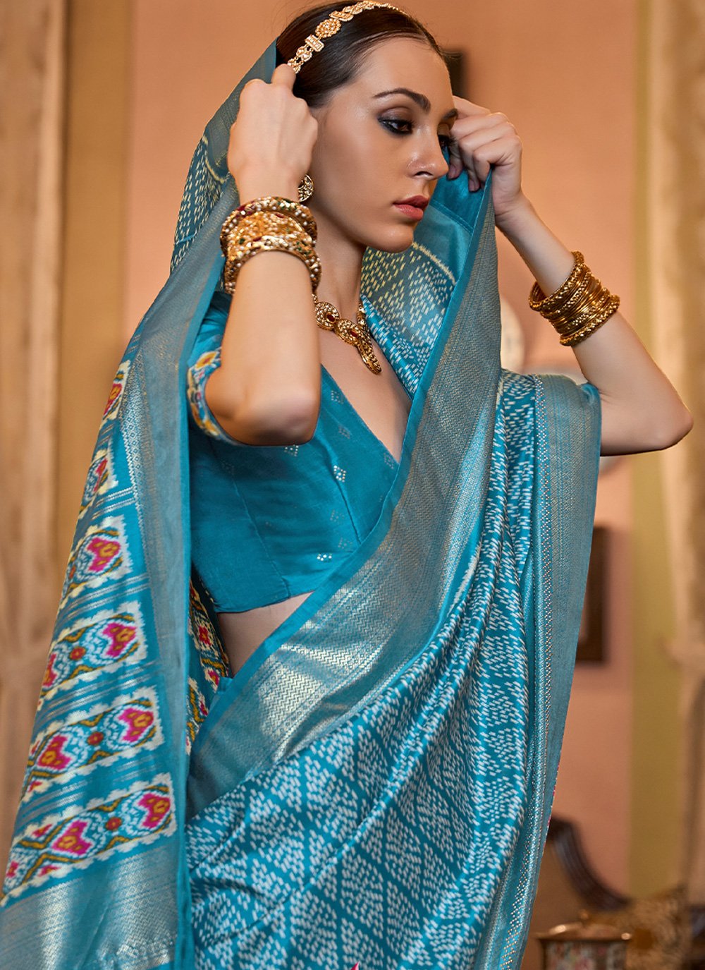 Contemporary Patola Silk Aqua Blue Print Saree