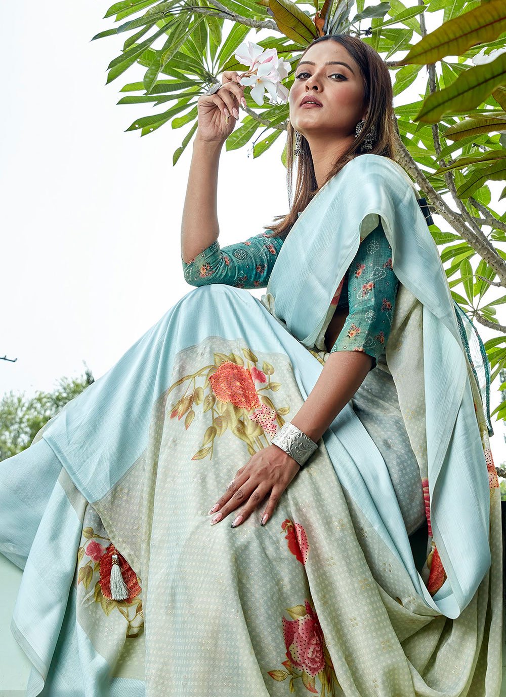 Contemporary Brasso Aqua Blue Fancy Work Saree