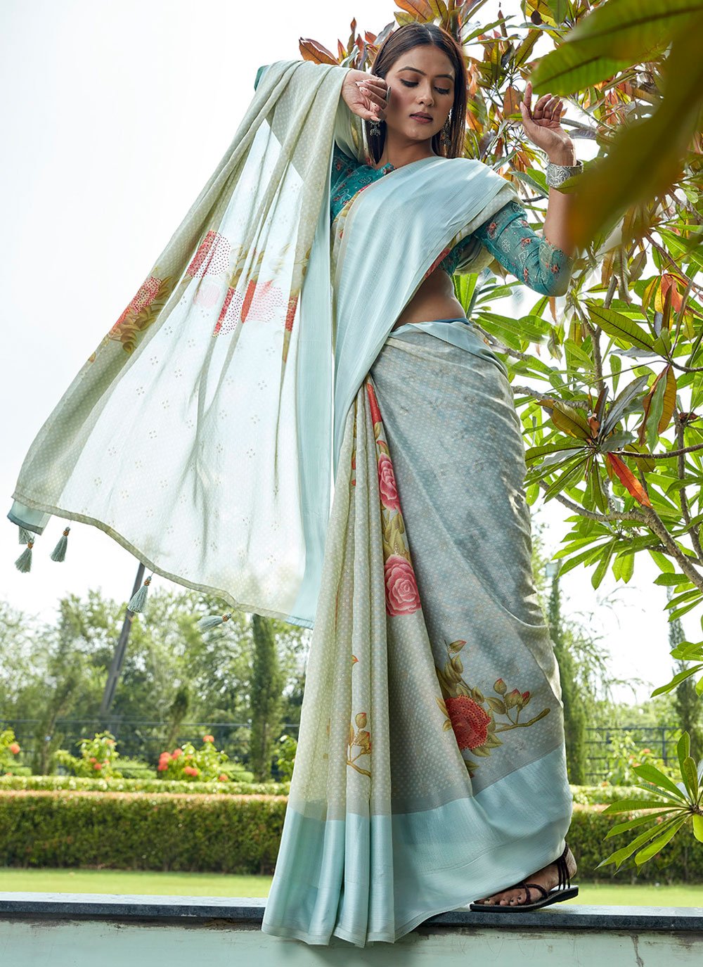 Contemporary Brasso Aqua Blue Fancy Work Saree