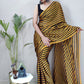 Trendy Saree Rangoli Silk Black Gold Strips Print Saree