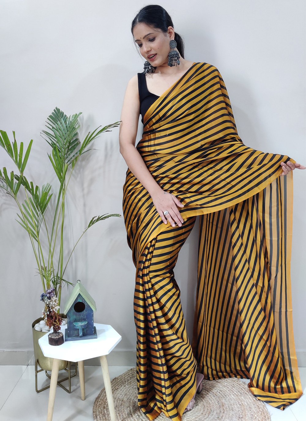 Trendy Saree Rangoli Silk Black Gold Strips Print Saree