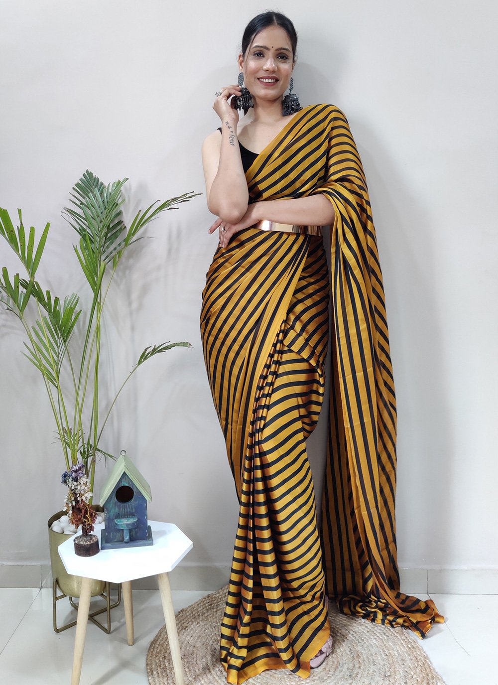 Trendy Saree Rangoli Silk Black Gold Strips Print Saree