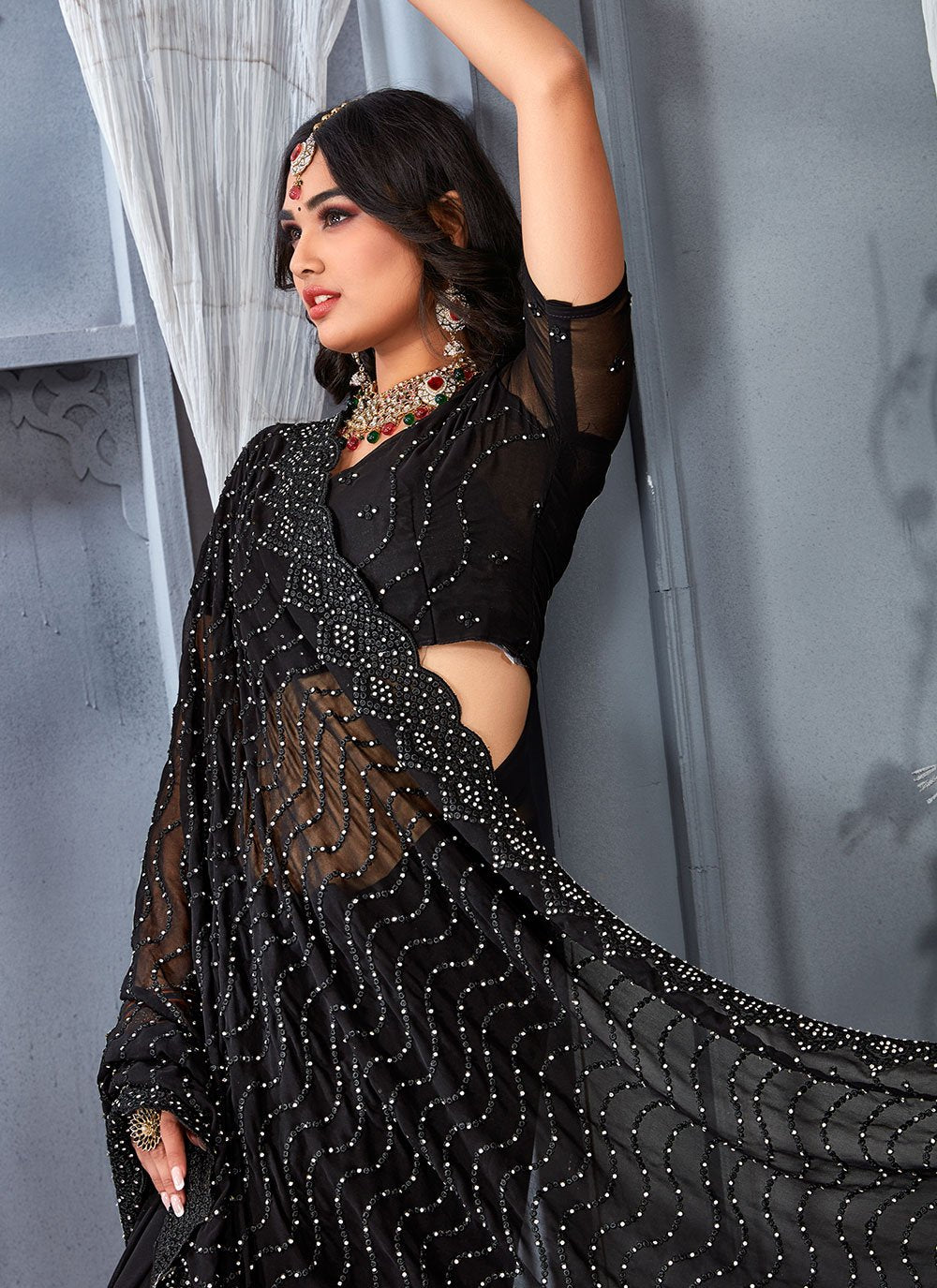 Classic Georgette Black Embroidered Saree