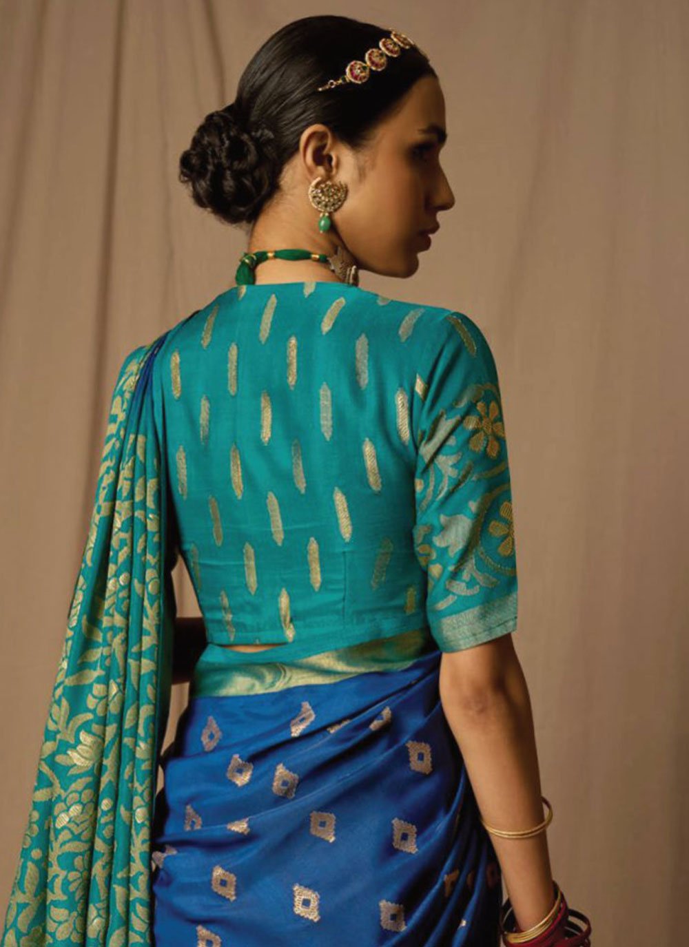 Classic Brasso Blue Morpeach Woven Saree