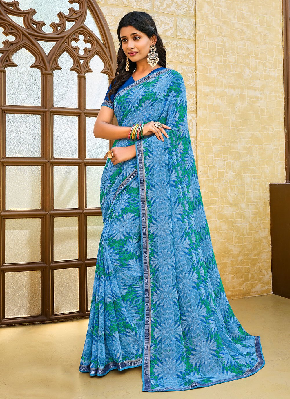 Contemporary Georgette Blue Fancy Work Saree