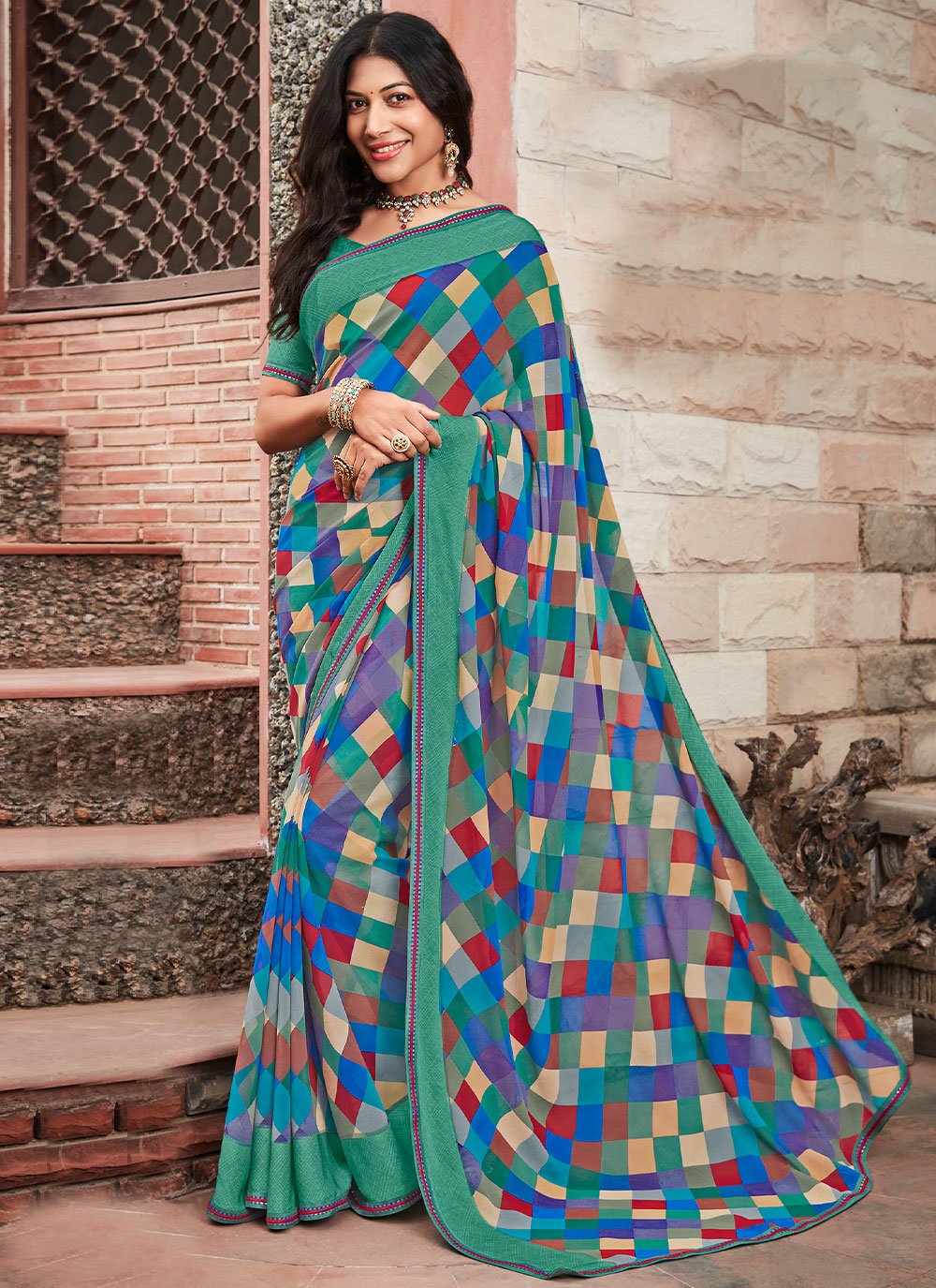 Classic Georgette Multi Colour Fancy Work Saree