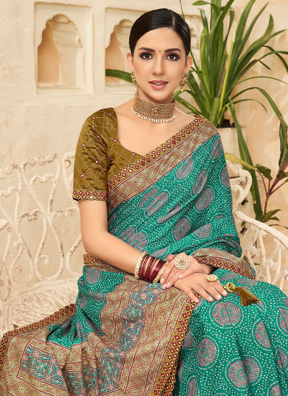 Contemporary Chinon Turquoise Bandhej Saree