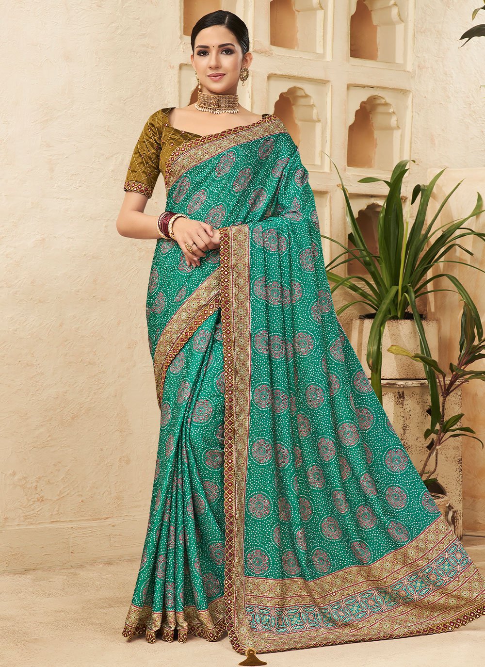 Contemporary Chinon Turquoise Bandhej Saree