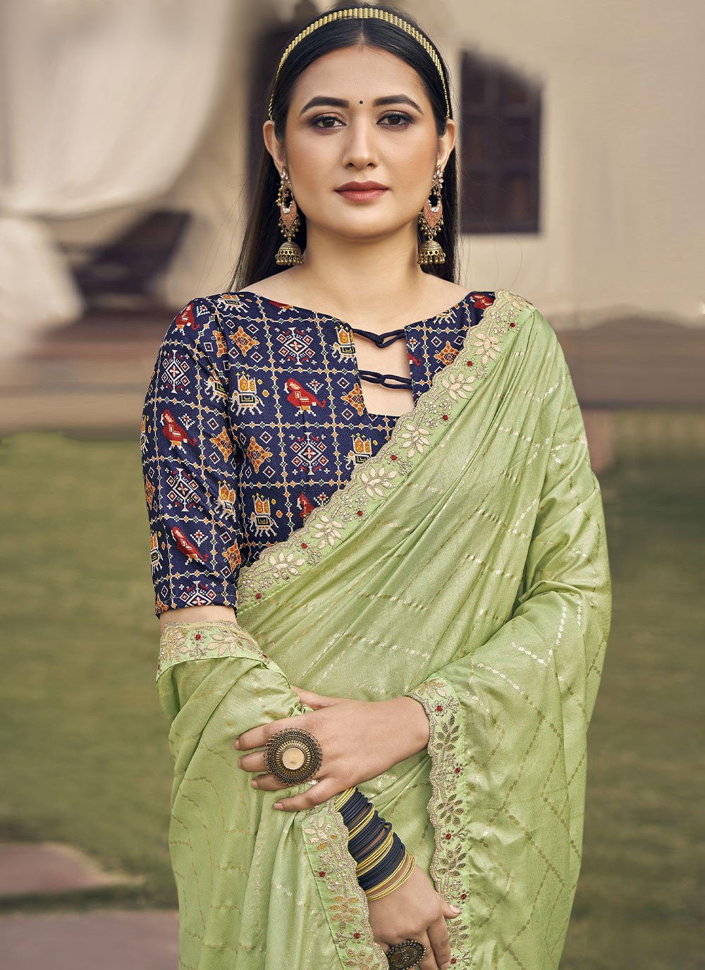 Classic Silk Green Embroidered Saree