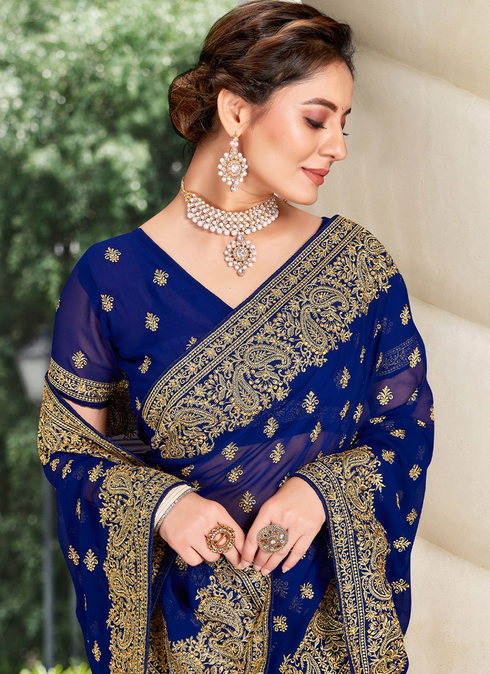 Classic Georgette Blue Embroidered Saree