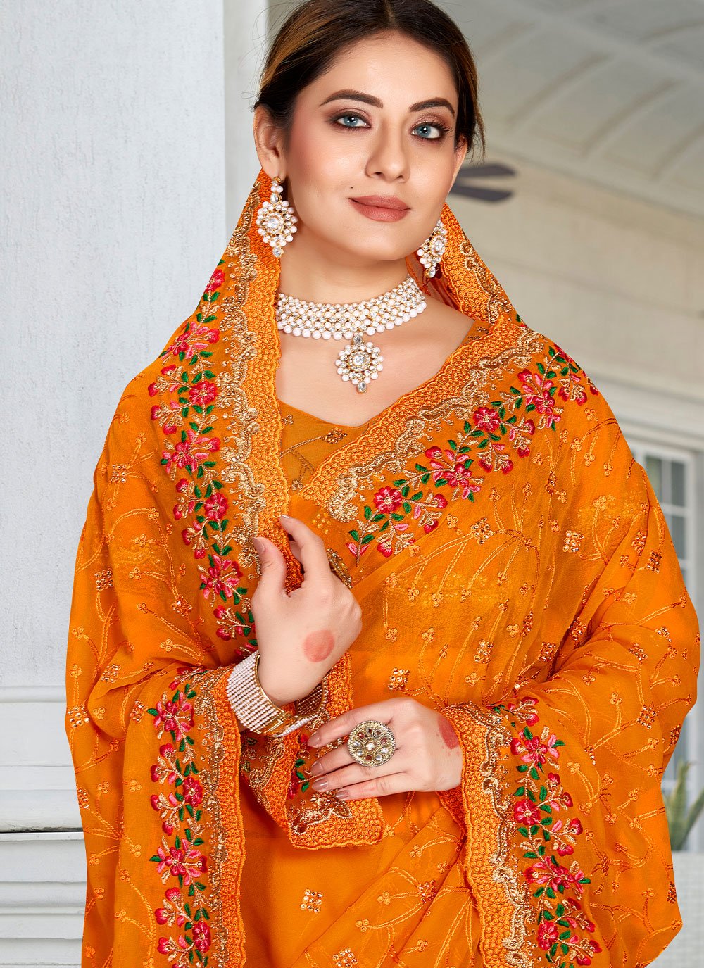 Classic Georgette Orange Embroidered Saree