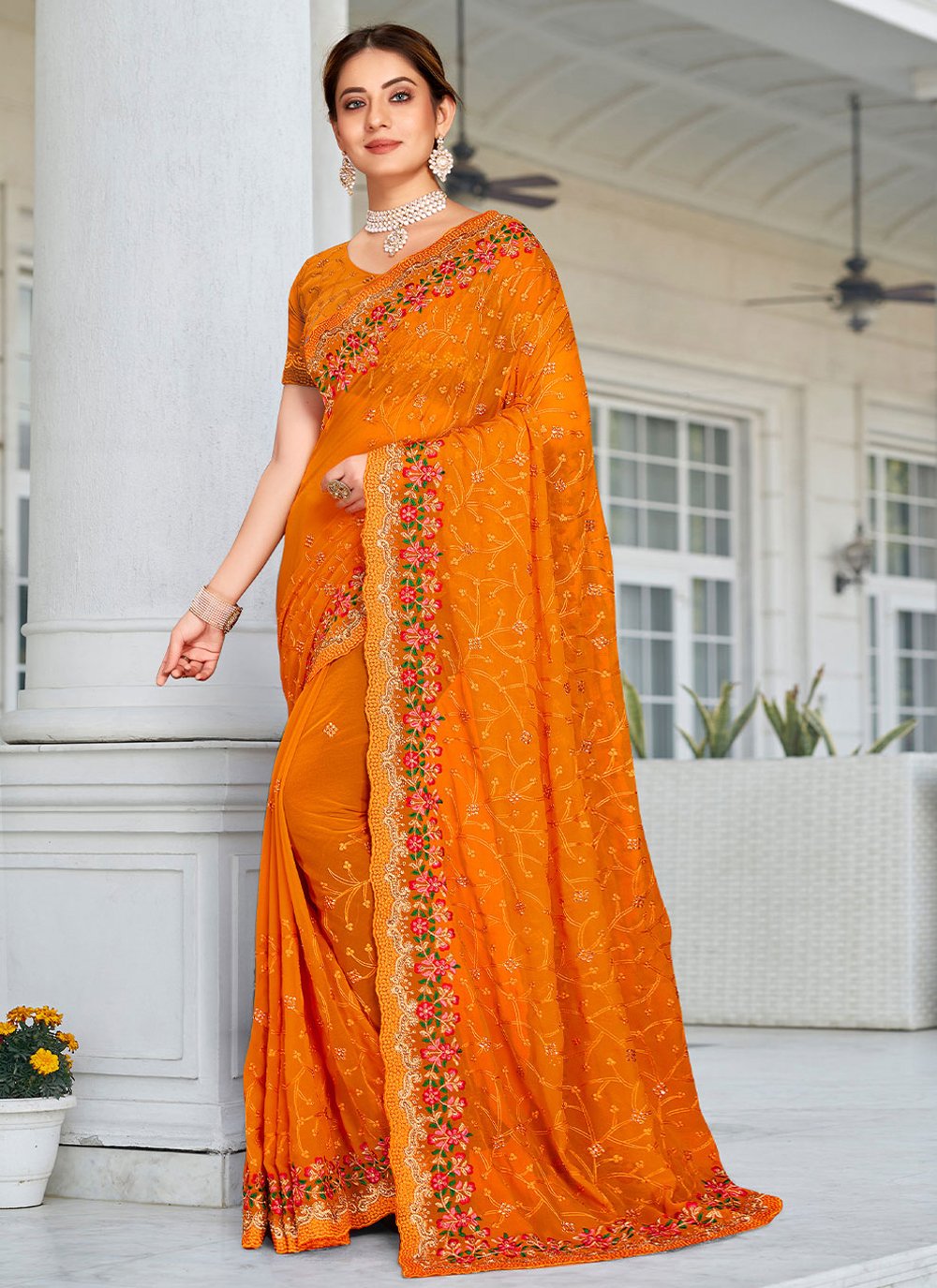 Classic Georgette Orange Embroidered Saree