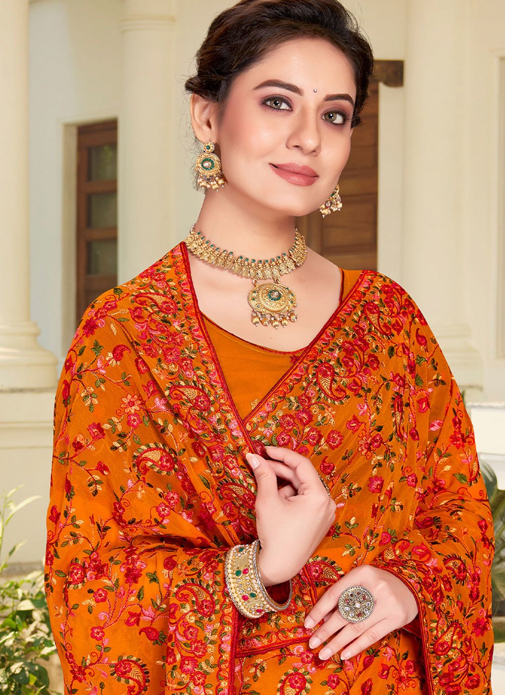 Classic Georgette Orange Embroidered Saree