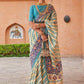 Contemporary Brasso Aqua Blue Cream Fancy Work Saree
