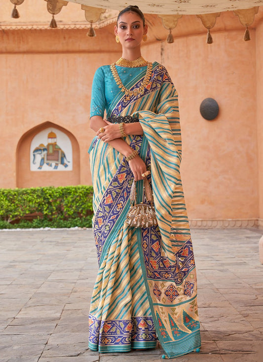 Contemporary Brasso Aqua Blue Cream Fancy Work Saree