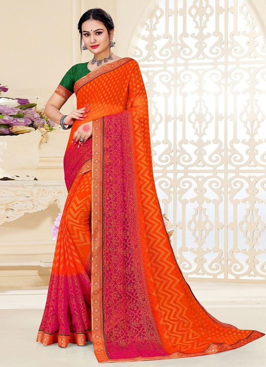 Contemporary Brasso Fancy Fabric Orange Patch Border Saree