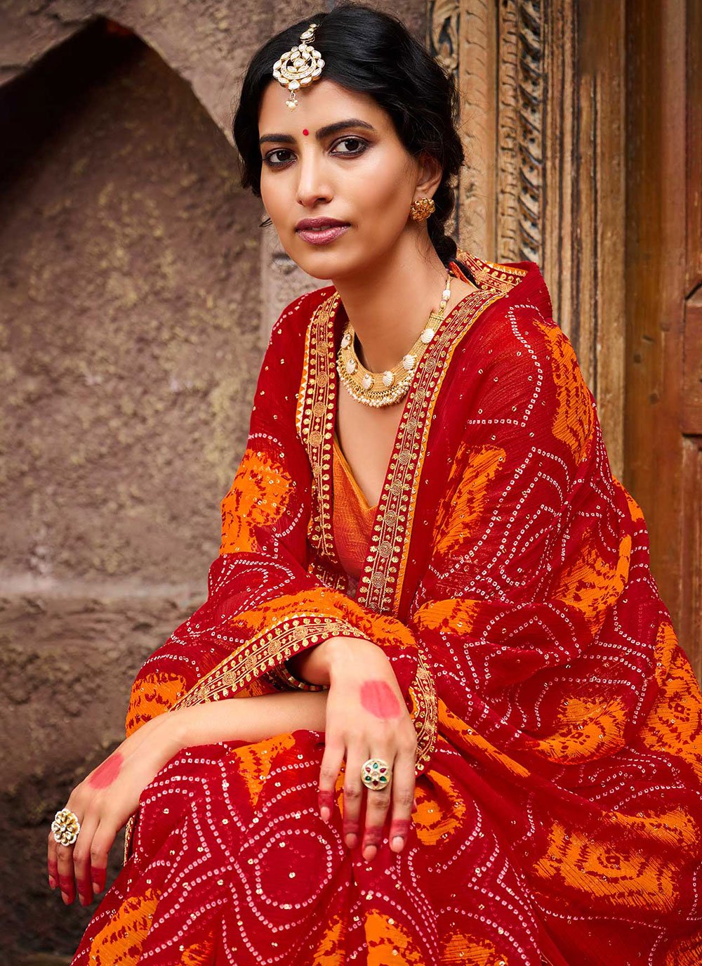 Contemporary Chiffon Red Bandhej Saree