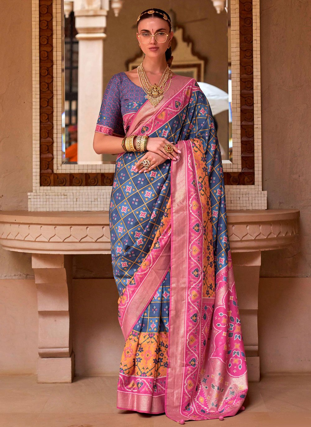 Contemporary Patola Silk Blue Pink Patch Border Saree