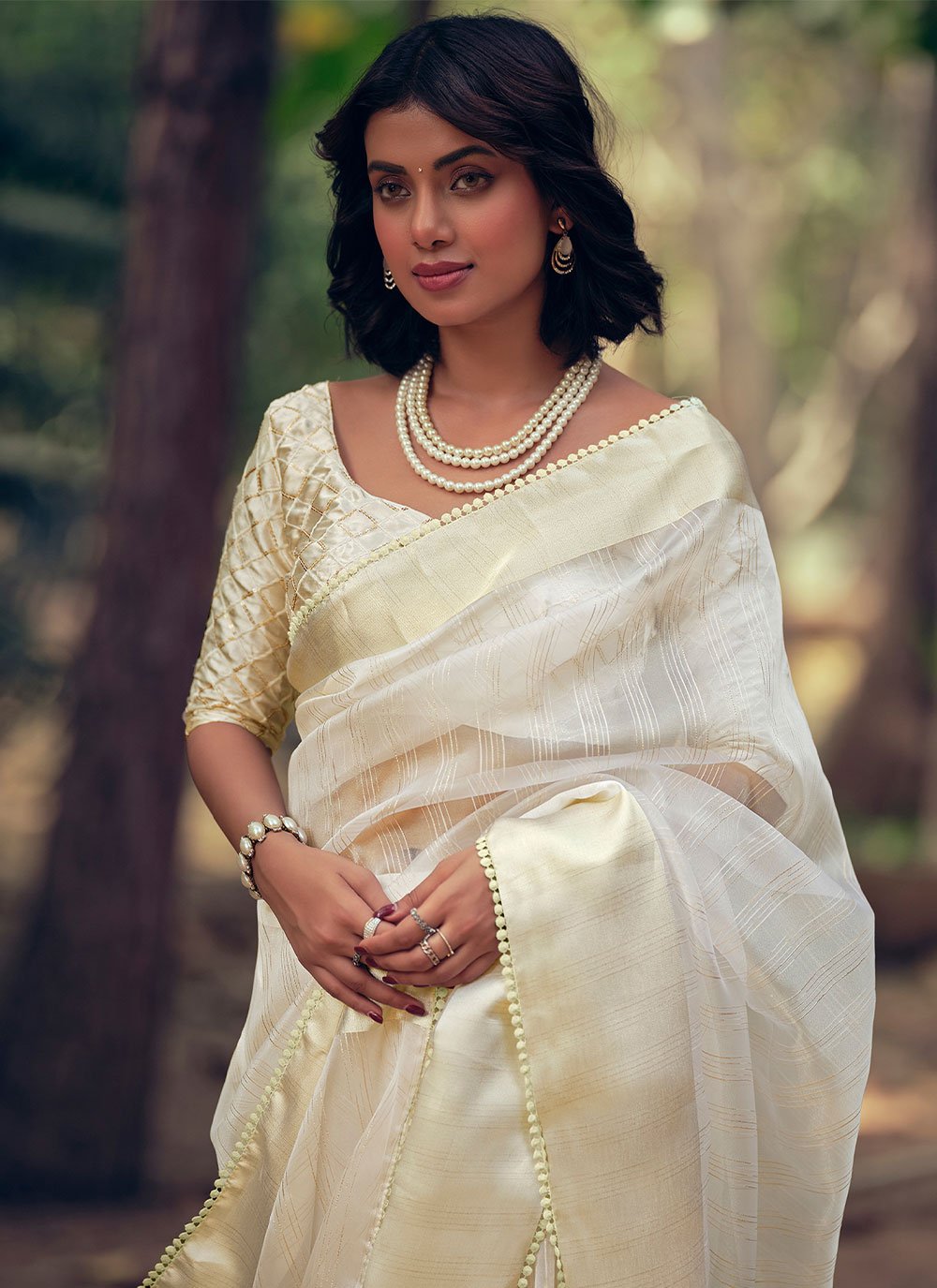 Contemporary Organza Cream Woven Saree