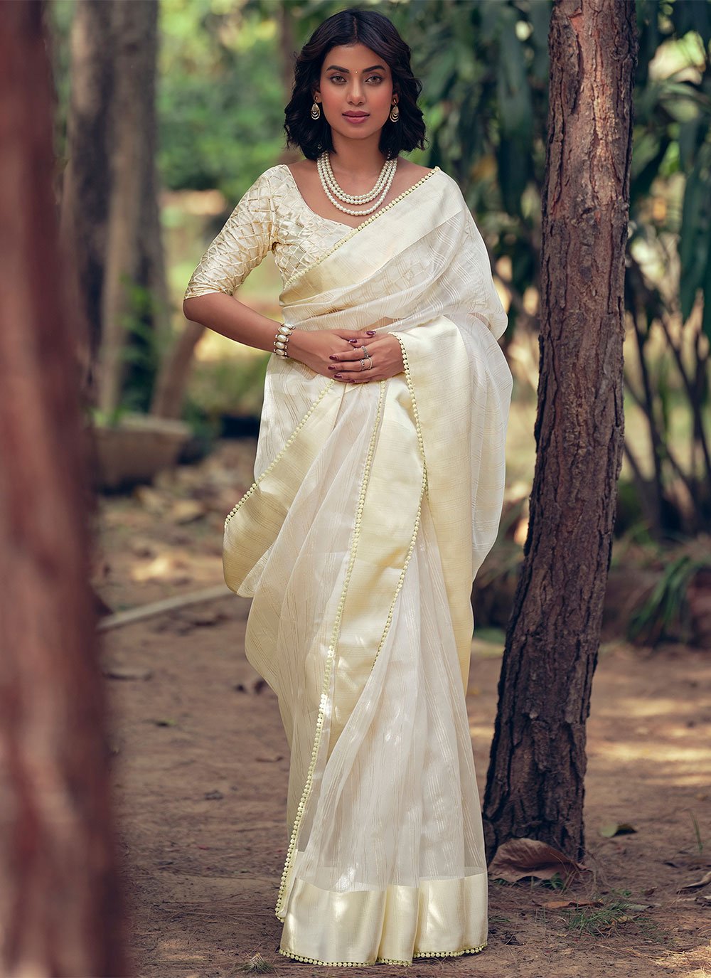 Contemporary Organza Cream Woven Saree