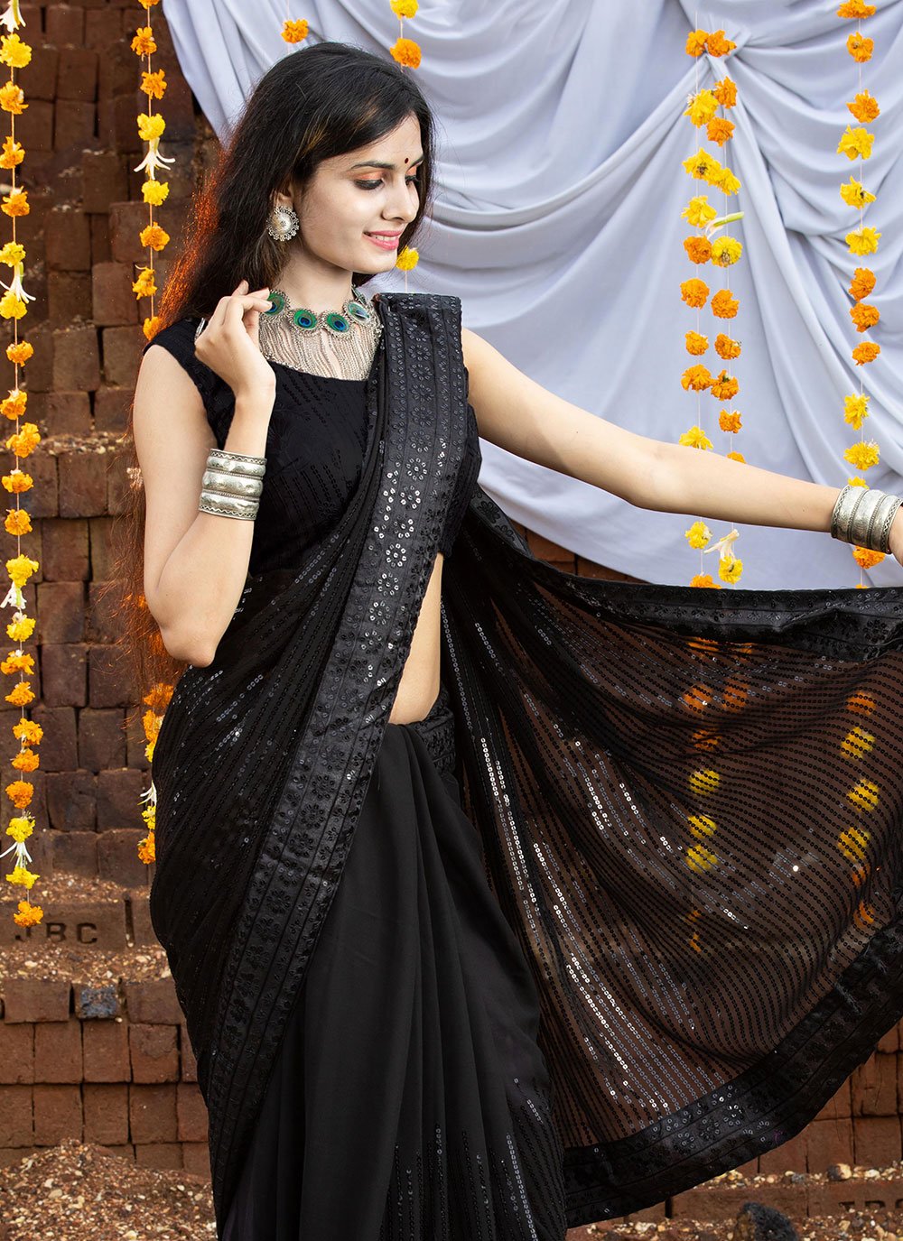 Classic Georgette Black Embroidered Saree