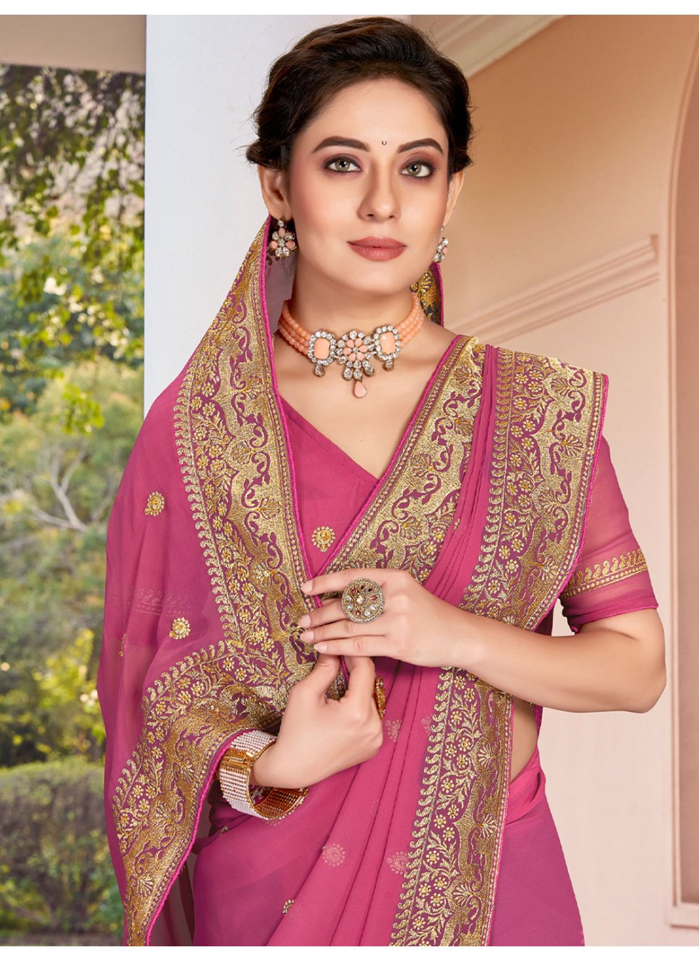 Classic Georgette Pink Embroidered Saree