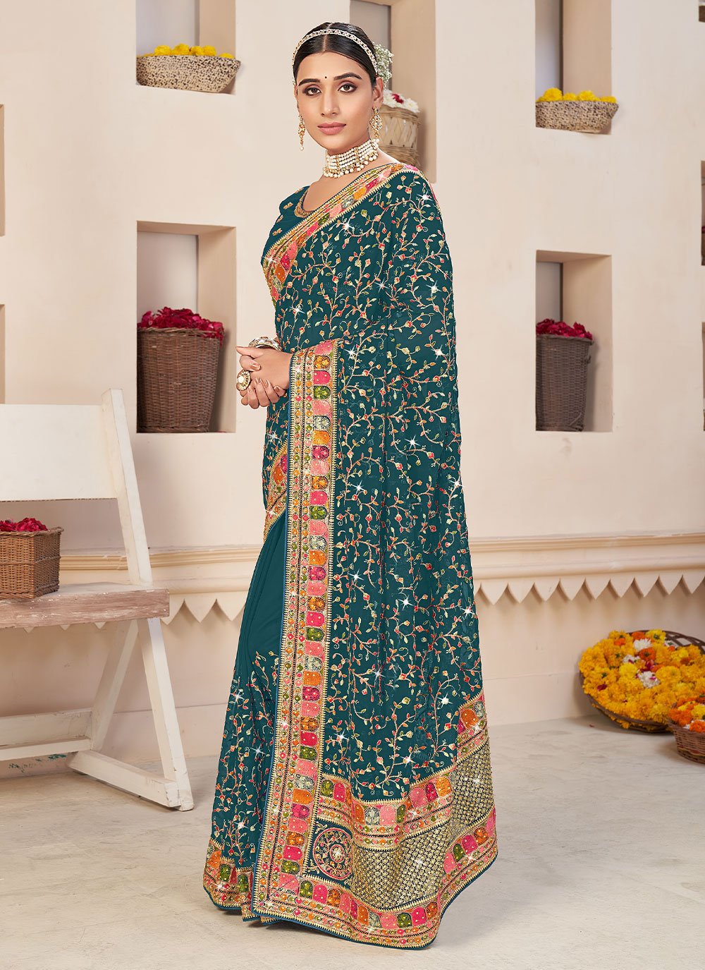 Classic Faux Georgette Teal Embroidered Saree