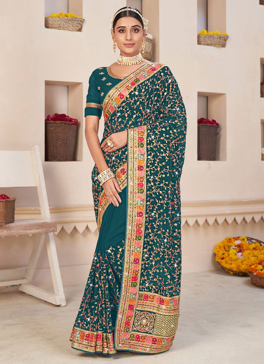 Classic Faux Georgette Teal Embroidered Saree