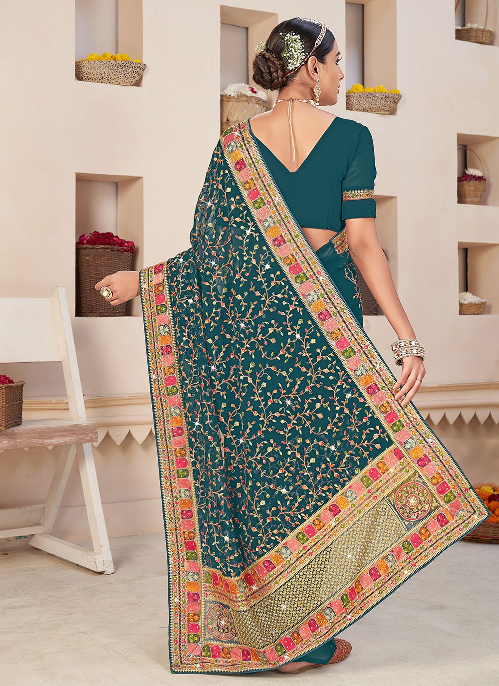 Classic Faux Georgette Teal Embroidered Saree