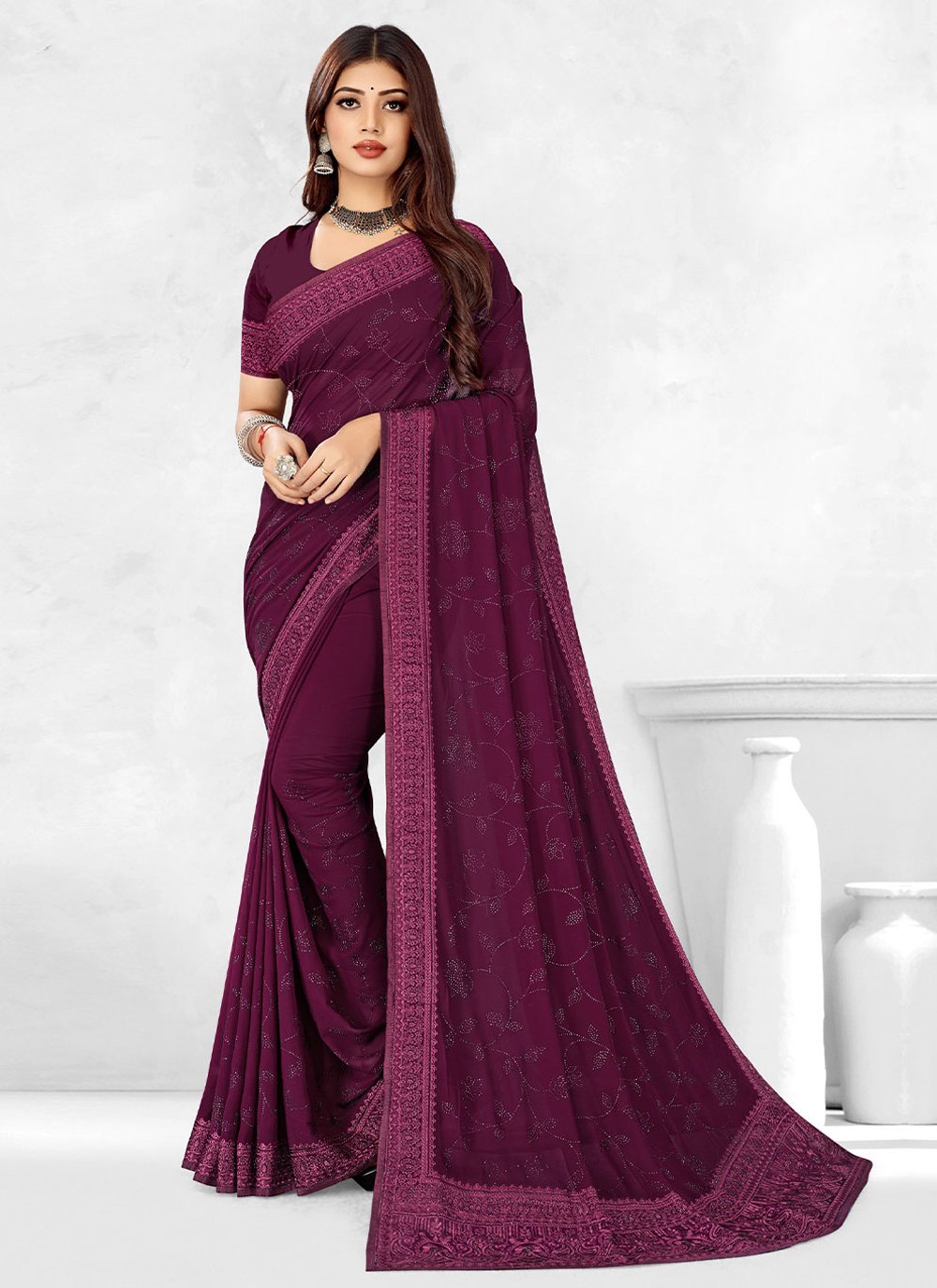 Classic Georgette Purple Embroidered Saree