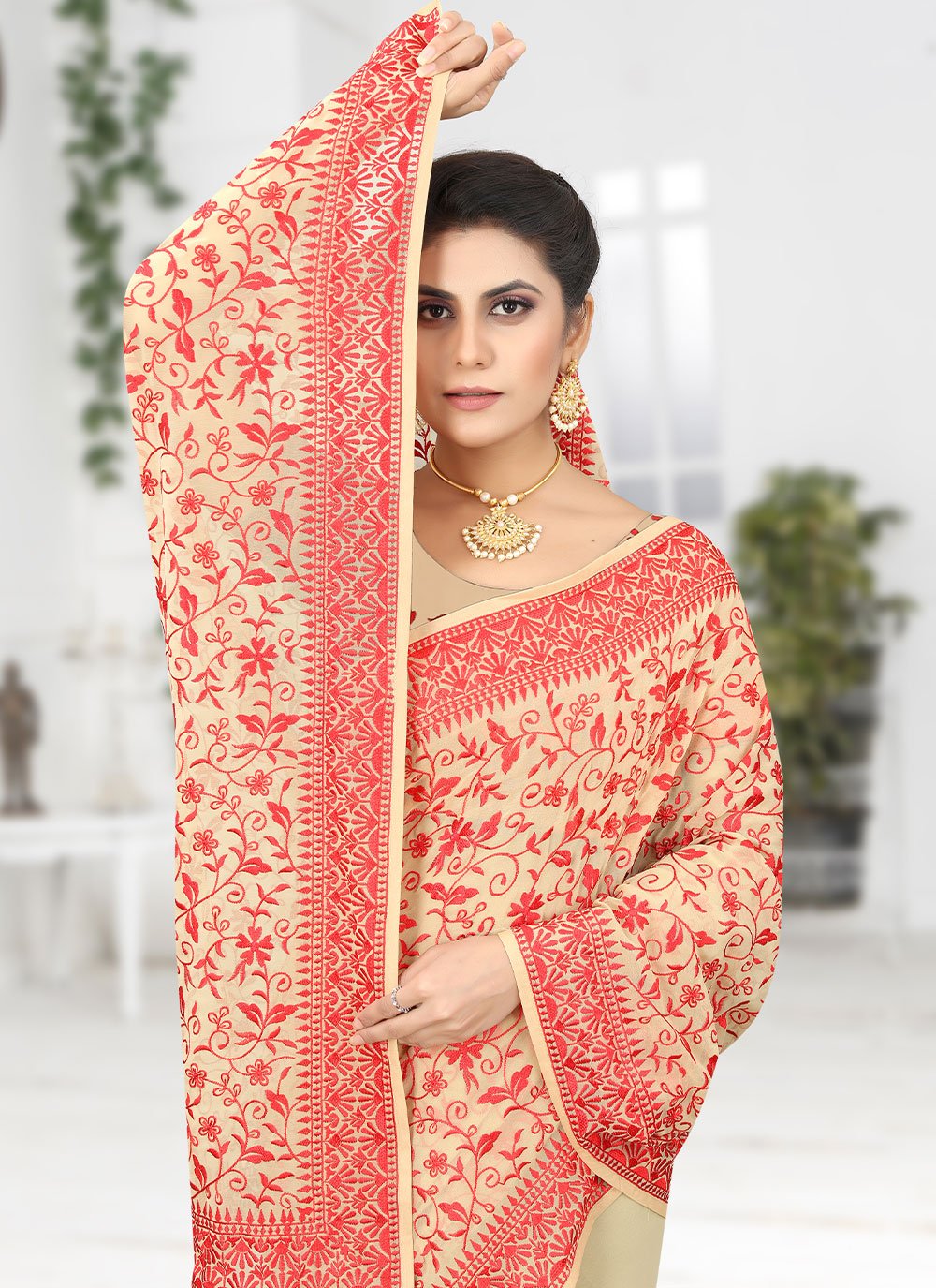 Classic Georgette Cream Embroidered Saree